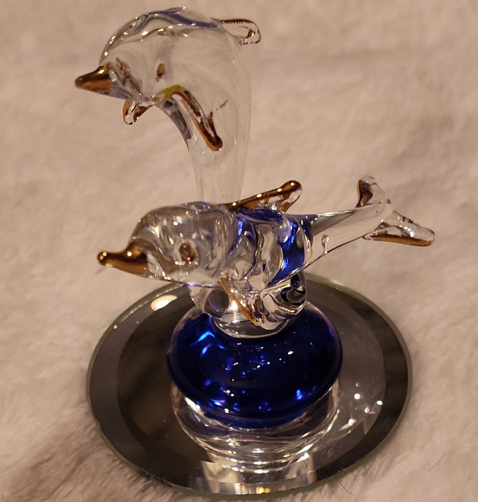 Like-New Glass Dolphins